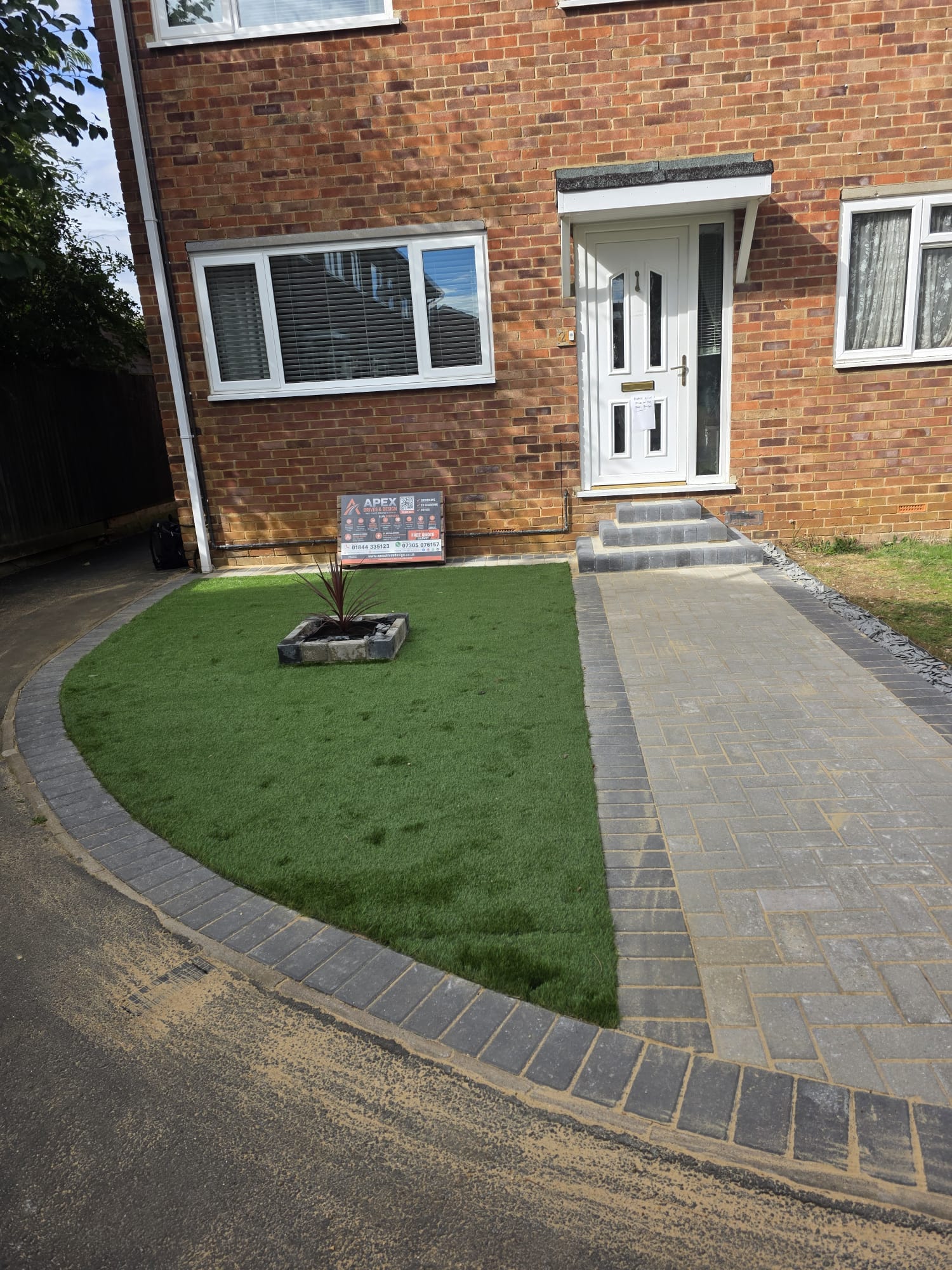 Completed front garden path and artificial lawn