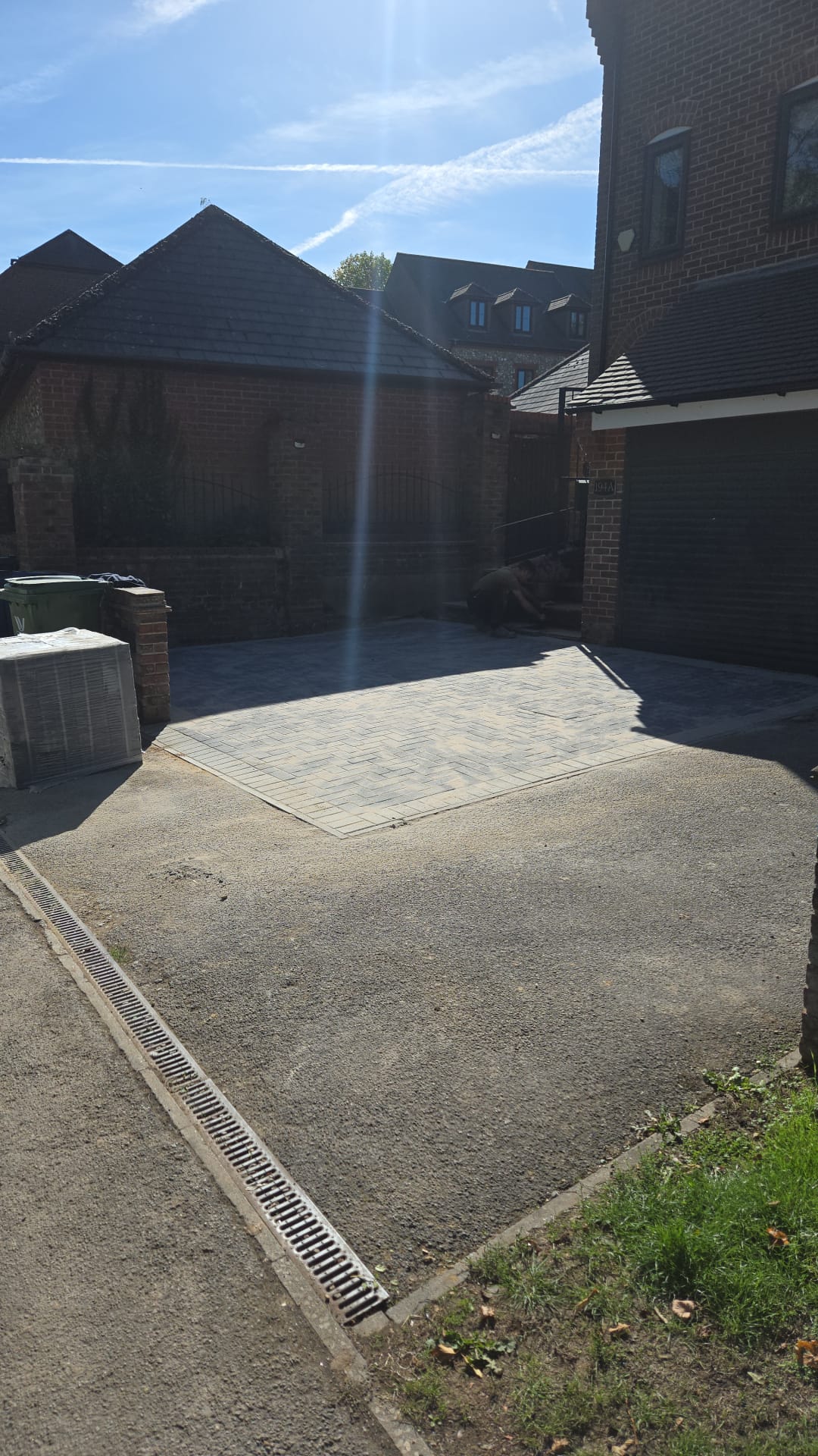 Completed paving and drainage around the garages